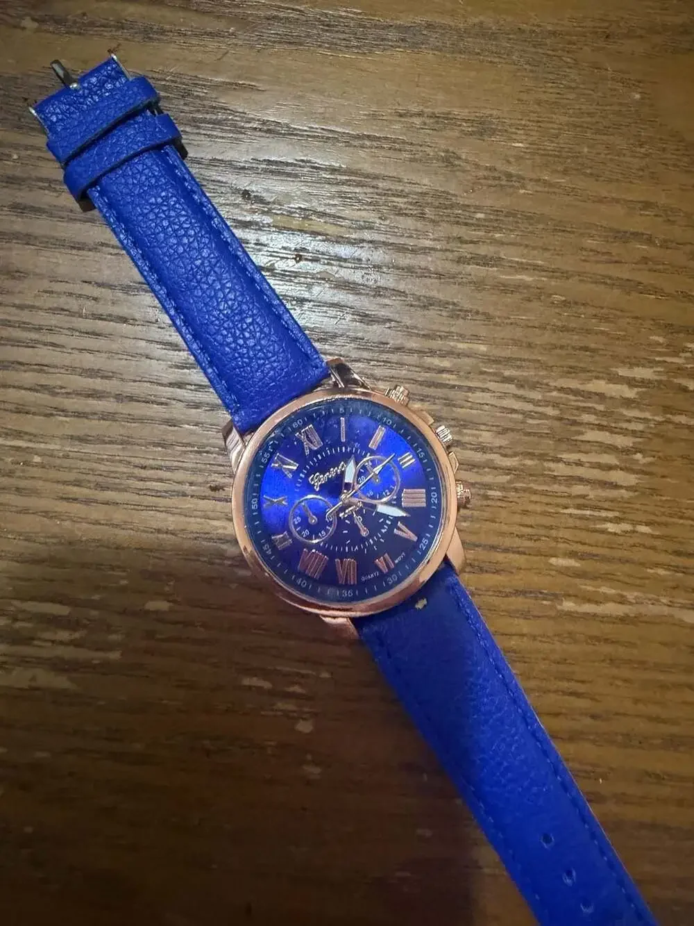 Geneva Roman Numeral Quartz Watch with Blue Leather Strap and Rose Gold Case